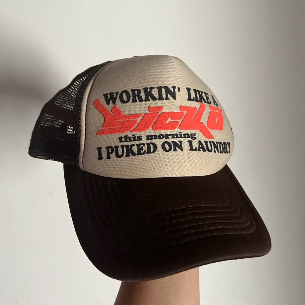 SICKO, this morning I puked on my laundry, trucker hat, brown/tan/orange